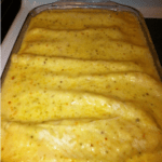 casserole dish with chicken enchiladas