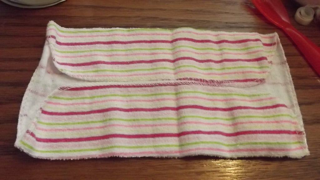 folded washcloth on a table top