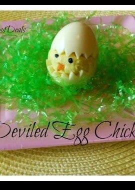 deviled egg chick on green grass on a pink plate