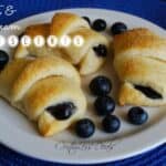 Fruit & Cream Crescents on a plate with berries and text