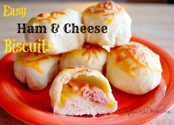 ham and cheese biscuits on a plate with writing