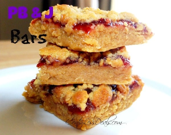 peanut butter and jelly bars on a white plate with a title