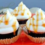 salted caramel cupcakes on a plate with caramel drizzled on and a title