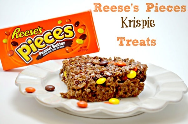 reese's pieces rice krispie treats on a white plate with writing