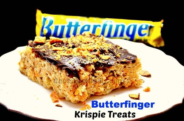 butterfinger bar with Butterfinger Rice Krispie Treats on a white plate
