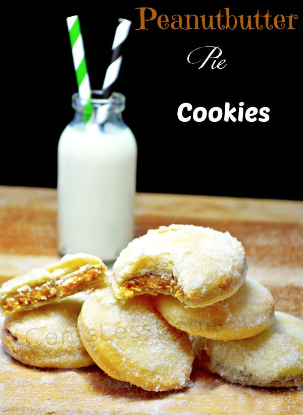 peanut butter pie cookies on a wooden board with milk in the background and a title