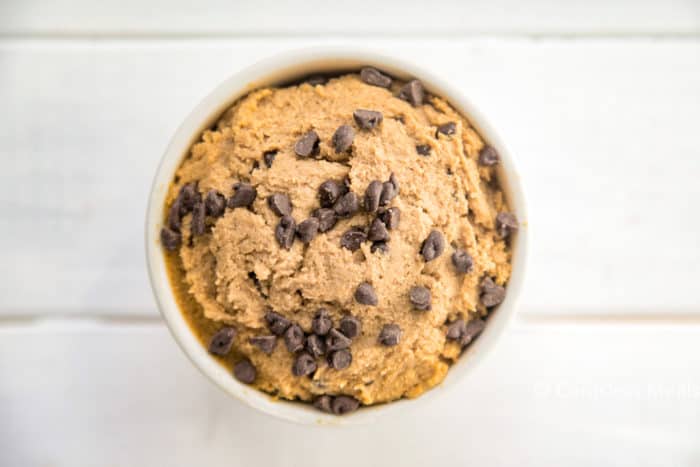 Edible cookie dough in a bowl with chocolate chips