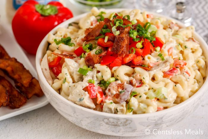 Ranch macaroni salad with bacon and chicken in a bowl