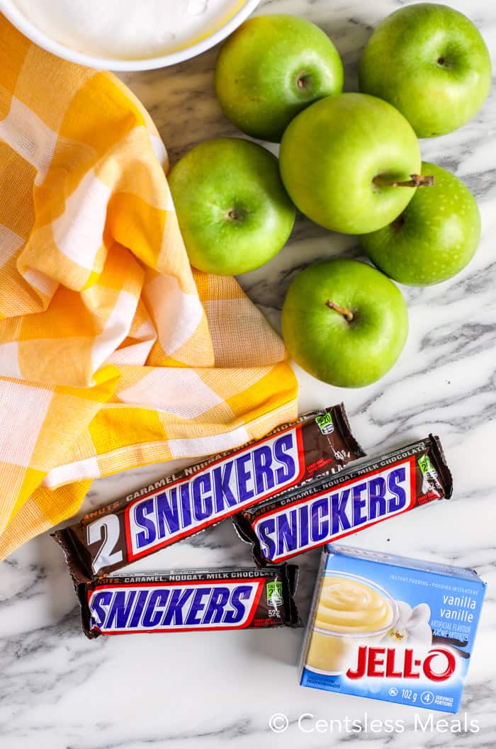 Ingredient for Snickers salad on a marble board