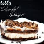 Nutella cheesecake lasagna on a white plate with a title