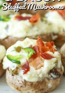 Jalapeno popper and bacon stuffed mushrooms on a plate with a title