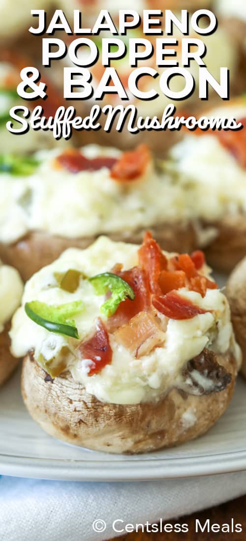 Jalapeno popper and bacon stuffed mushrooms on a plate with a title