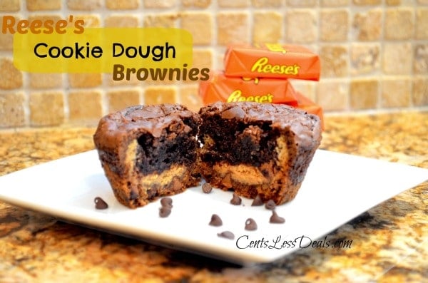 Reese's cookie dough brownie on a white plate cut in half to show the inside with Reese's peanut butter cups in the background and a title