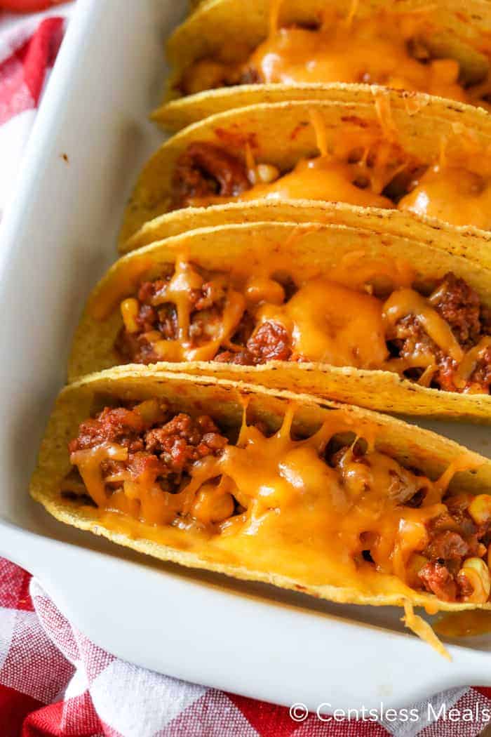 Sloppy joe tacos in a white casserole dish