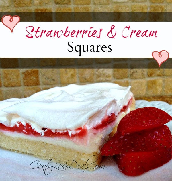 Strawberries and cream squares topped with whipped cream on a white plate with strawberries and a title