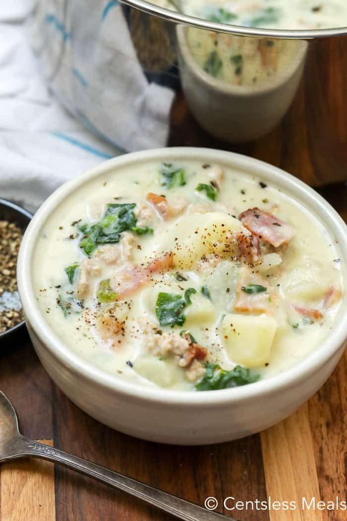 Zuppa Toscana in a bowl garnished with pepper