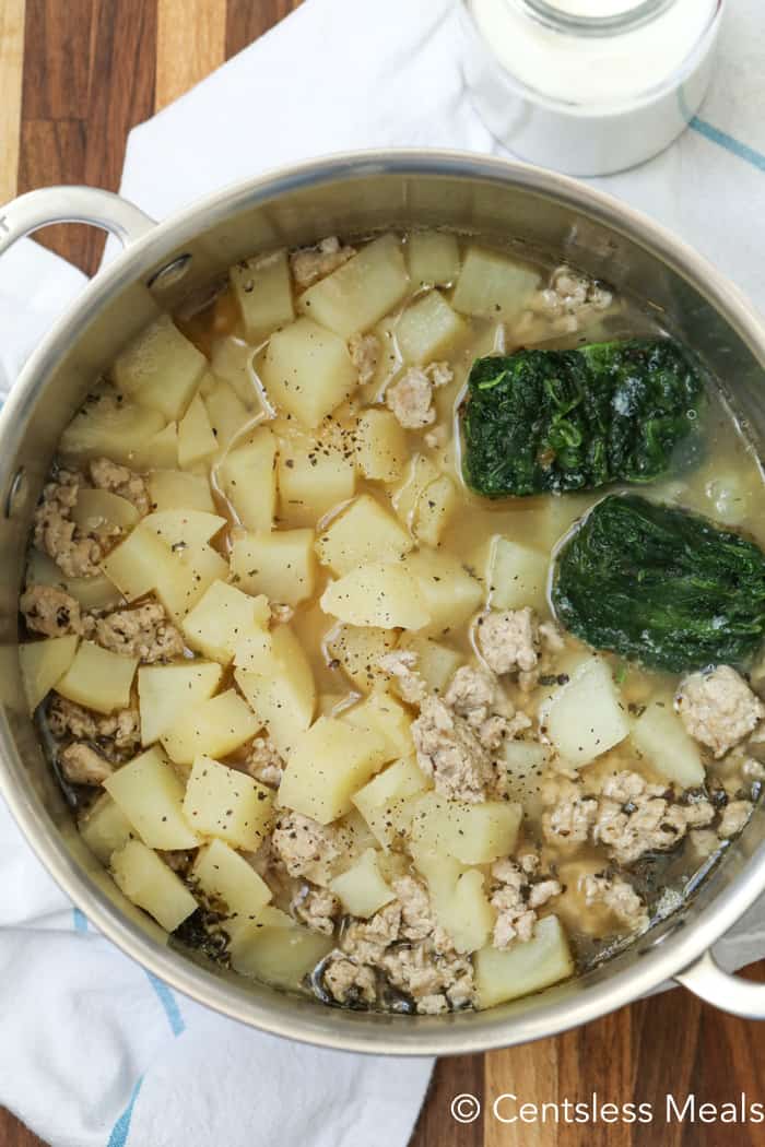 Zuppa Toscana ingredients in a pot