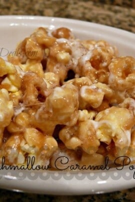 Marshmallow caramel popcorn in a bowl with writing