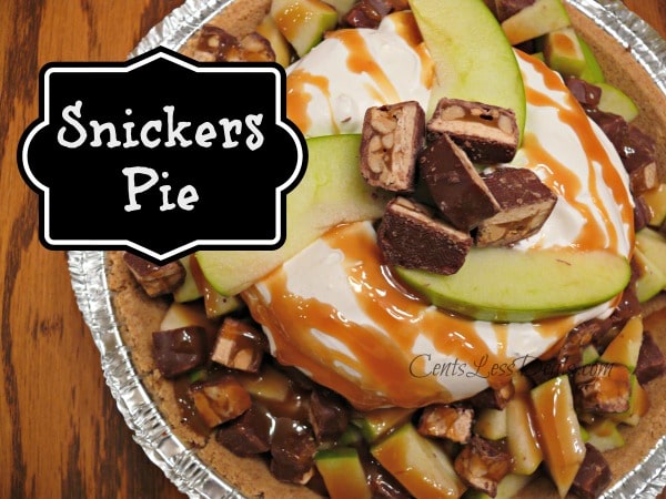 Snickers pie ingredients in a pie plate with a title