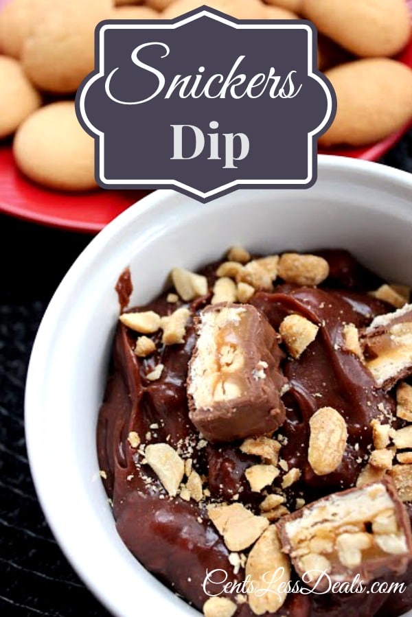 Snickers dip in a white bowl with cookies in the background and a title