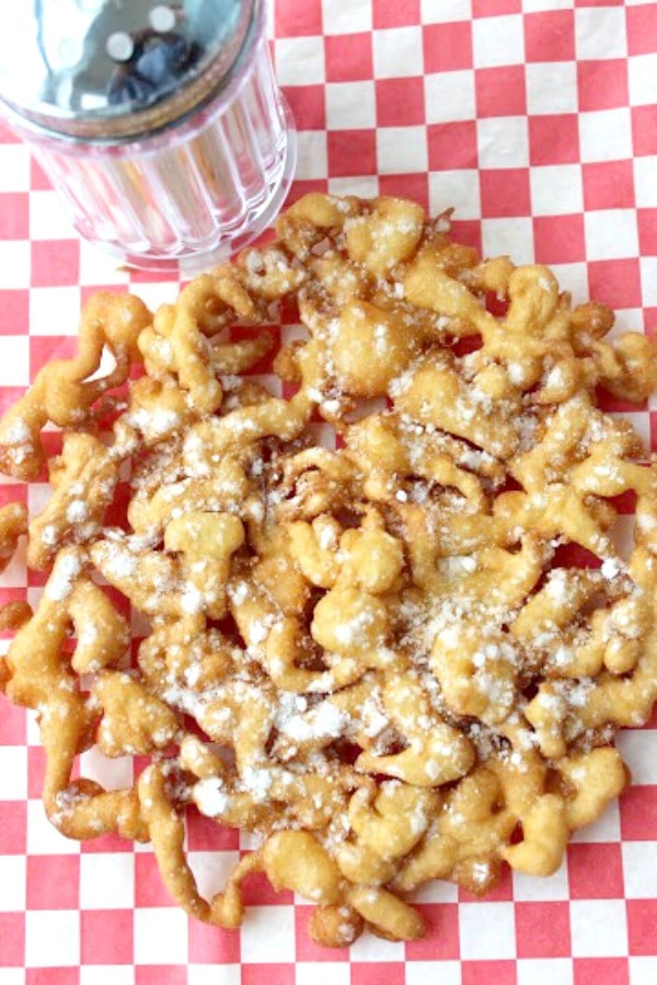 Funnel cakes sprinkled with powdered sugar