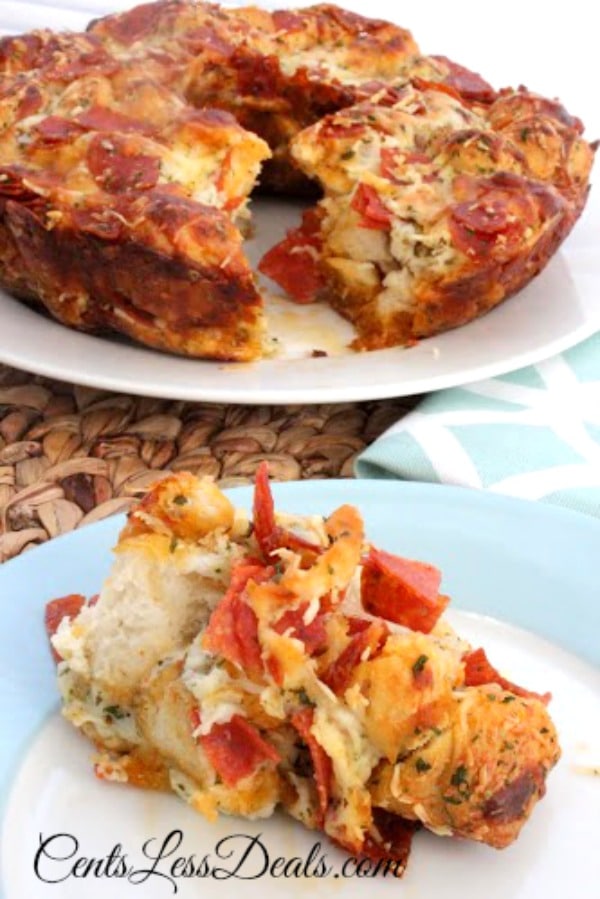 Pizza pull-apart bread on a plate with the rest on a plate in the background