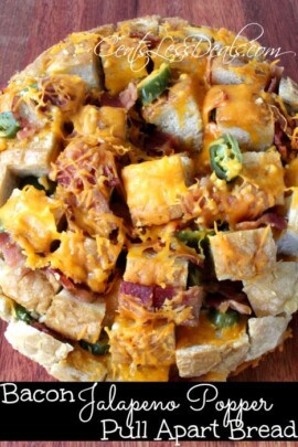 Bacon jalapeno popper pull-apart bread on a wooden board with a title