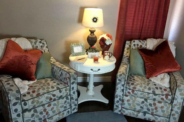 Cozy living room, two chairs with a table in between them