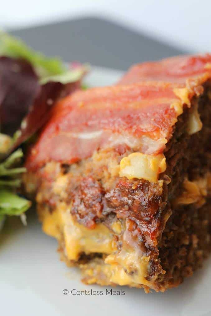 Piece of cheeseburger meatloaf on a plate