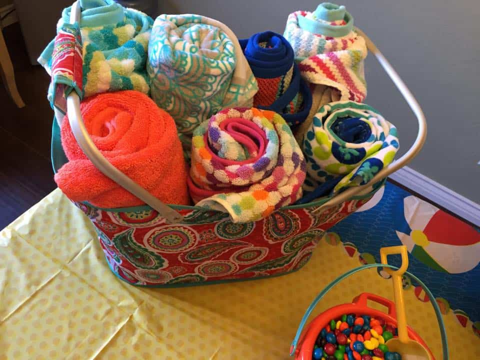 Basket of rolled beach towels