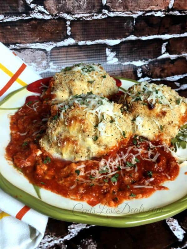 3 cheese chicken roll ups served on a plate