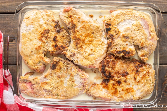 Pork chops in a casserole dish for pork chops and potato casserole