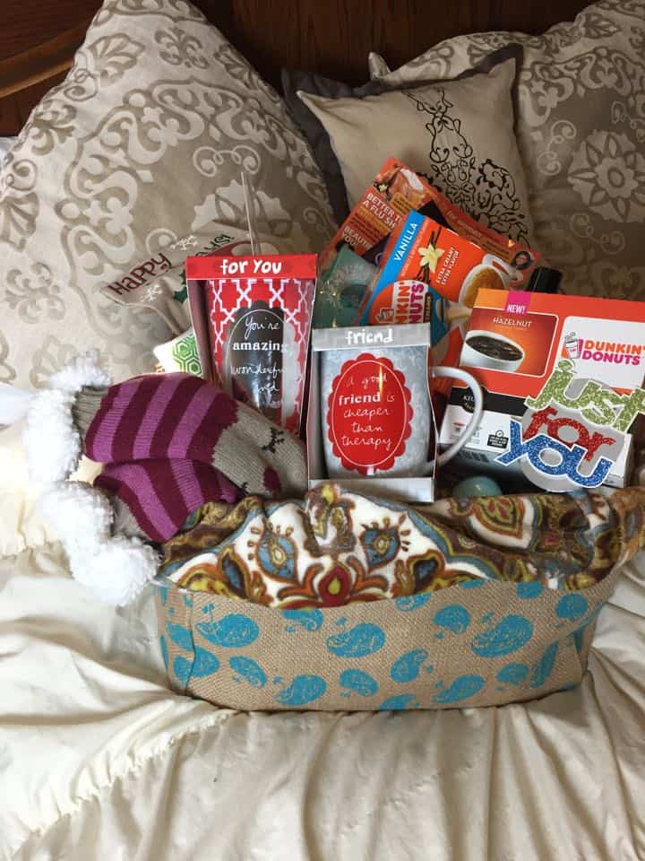 Basket of gifts on a bed