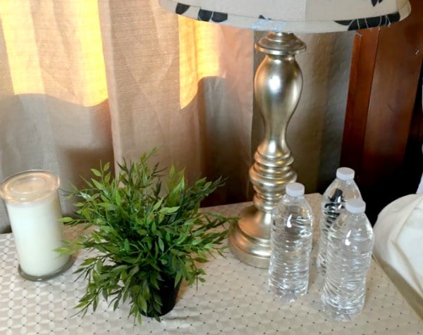 Bedside table with water bottles