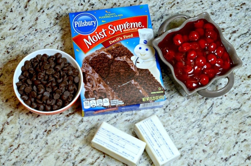 Ingredients for chocolate cherry dump cake on a countertop