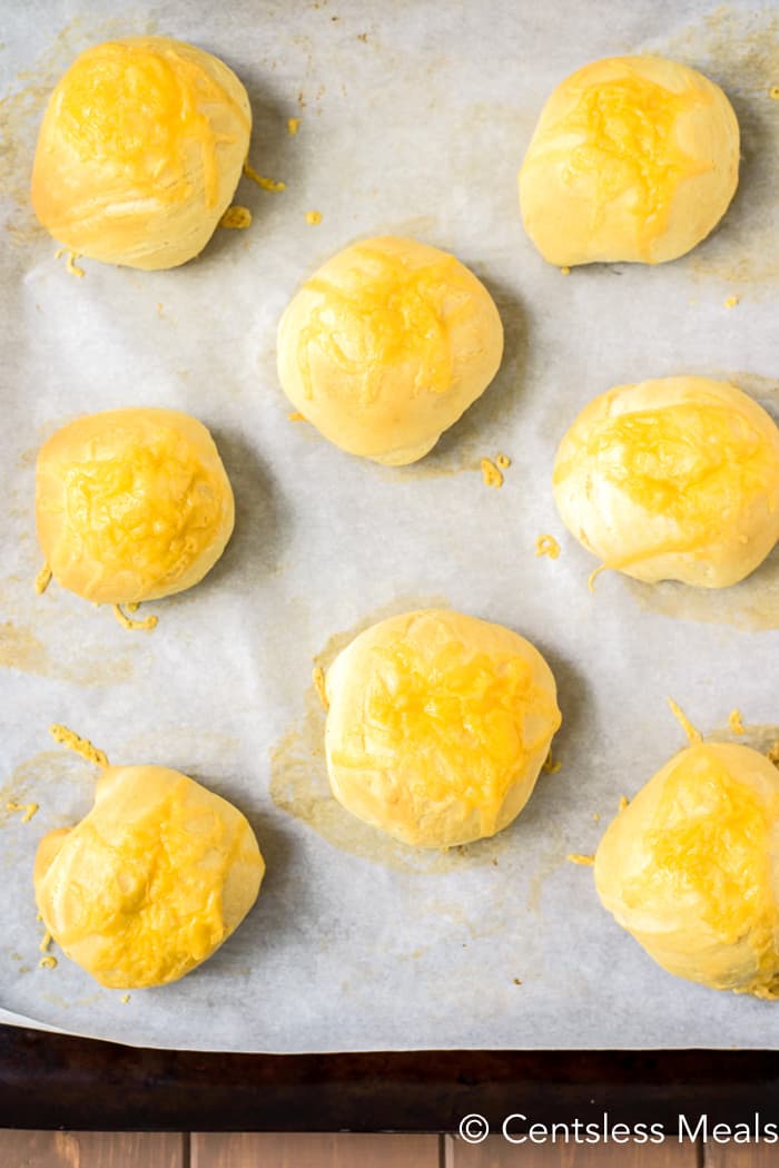 Bacon cream cheese bombs on parchment paper