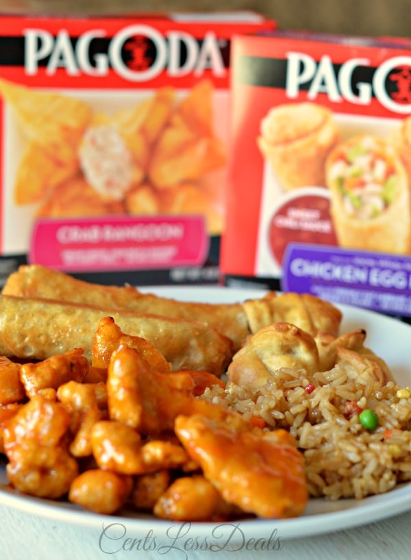 Orange chicken recipe on a plate with rice and spring rolls and Pagoda packages in the background