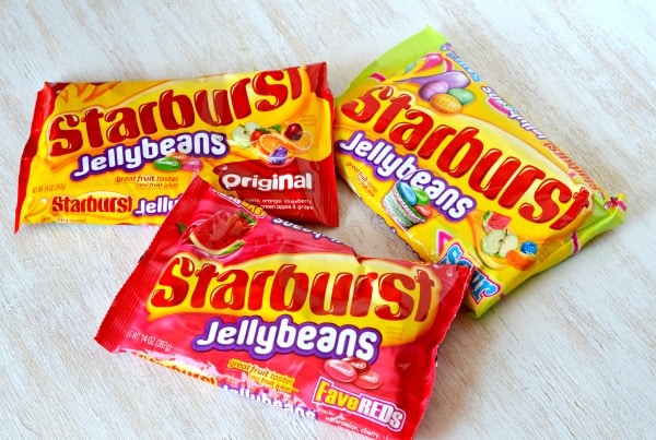 Starburst jelly bean packages on a wooden board