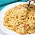 Easy chicken spaghetti on a plate with a fork