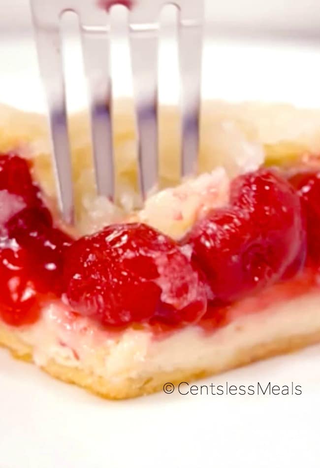 Cherry cream cheese bake with a fork