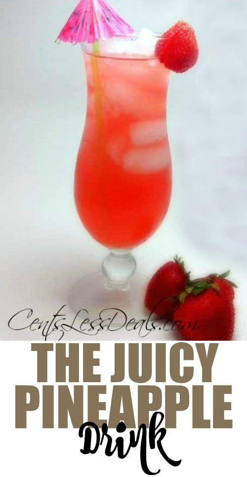 Juicy pineapple drink in a glass with ice and strawberries and a title