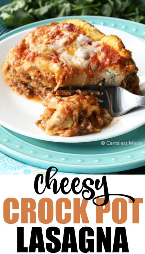 Cheesy Crock-Pot lasagna on a plate with a fork and a title