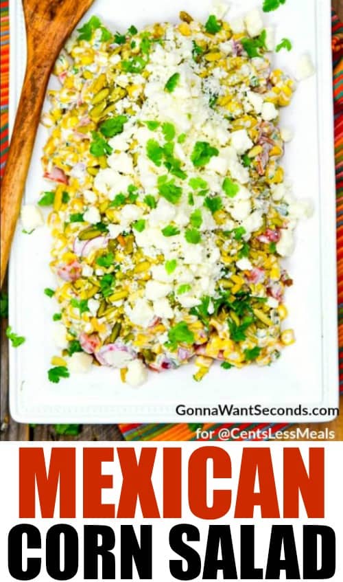 Mexican corn salad on a white plate with a wooden spoon and a title