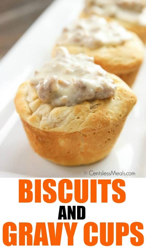 Biscuits and gravy cups on a white plate with a title