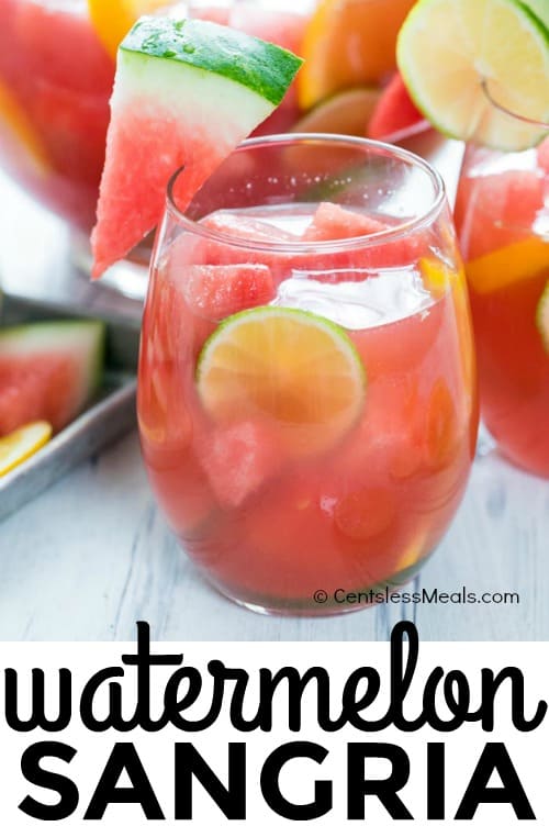Watermelon sangria in a glass with a title