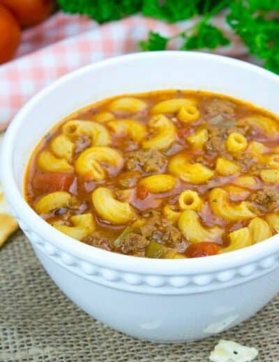 Beef and Tomato Macaroni Soup in a white bowl