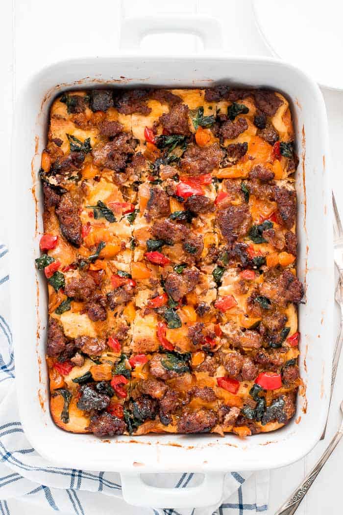 Egg and sausage breakfast casserole in a white casserole dish