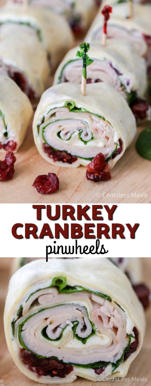 Turkey cranberry pinwheels on a wooden board with a title