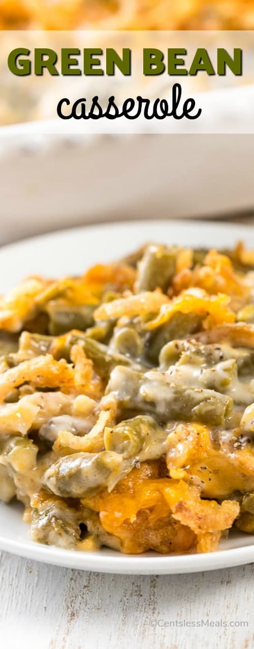 Green bean casserole on a white plate with writing