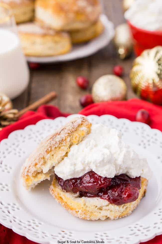 Cranberry Shortcake on a white plate with a glass of milk in the background